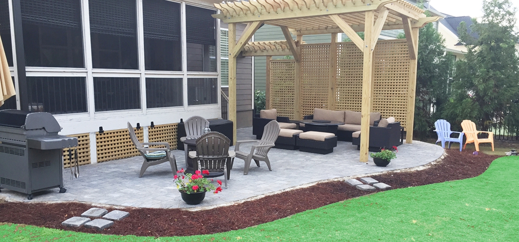 Outdoor living space custom paver and pergola